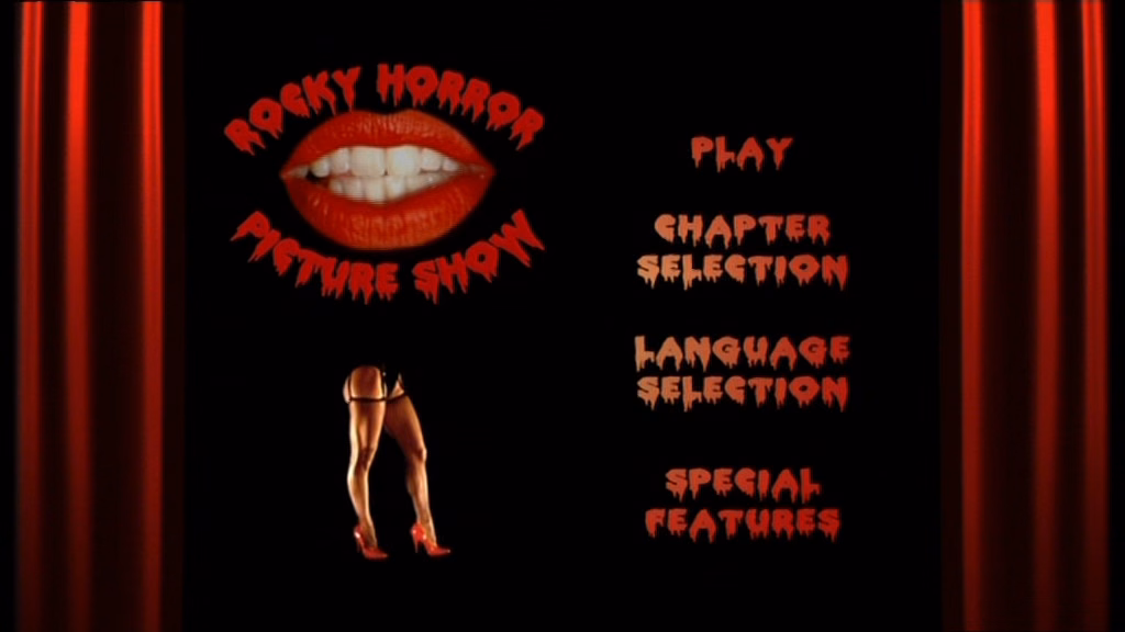 Red lips to the top left with some legs underneath it. To the right are four menu items: 'Play', 'Chapter Selection', 'Language Selection', and 'Special Features'. Red curtains are on each side of the screen.